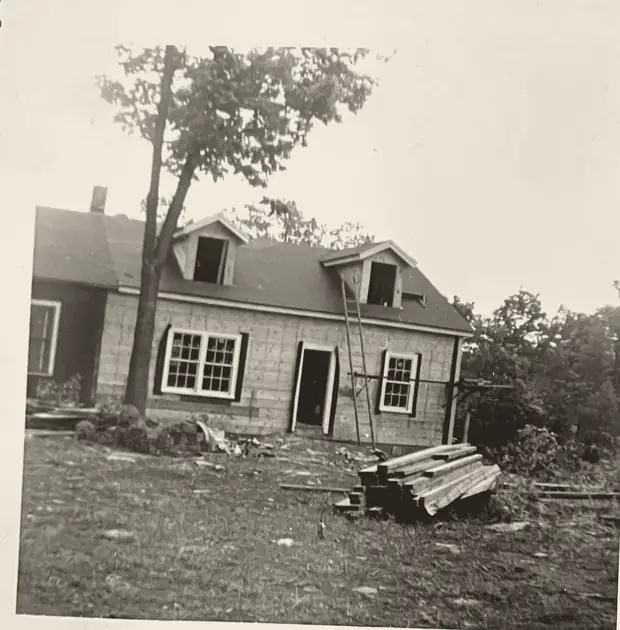 Archival photo of repair work on the Wayside Church building